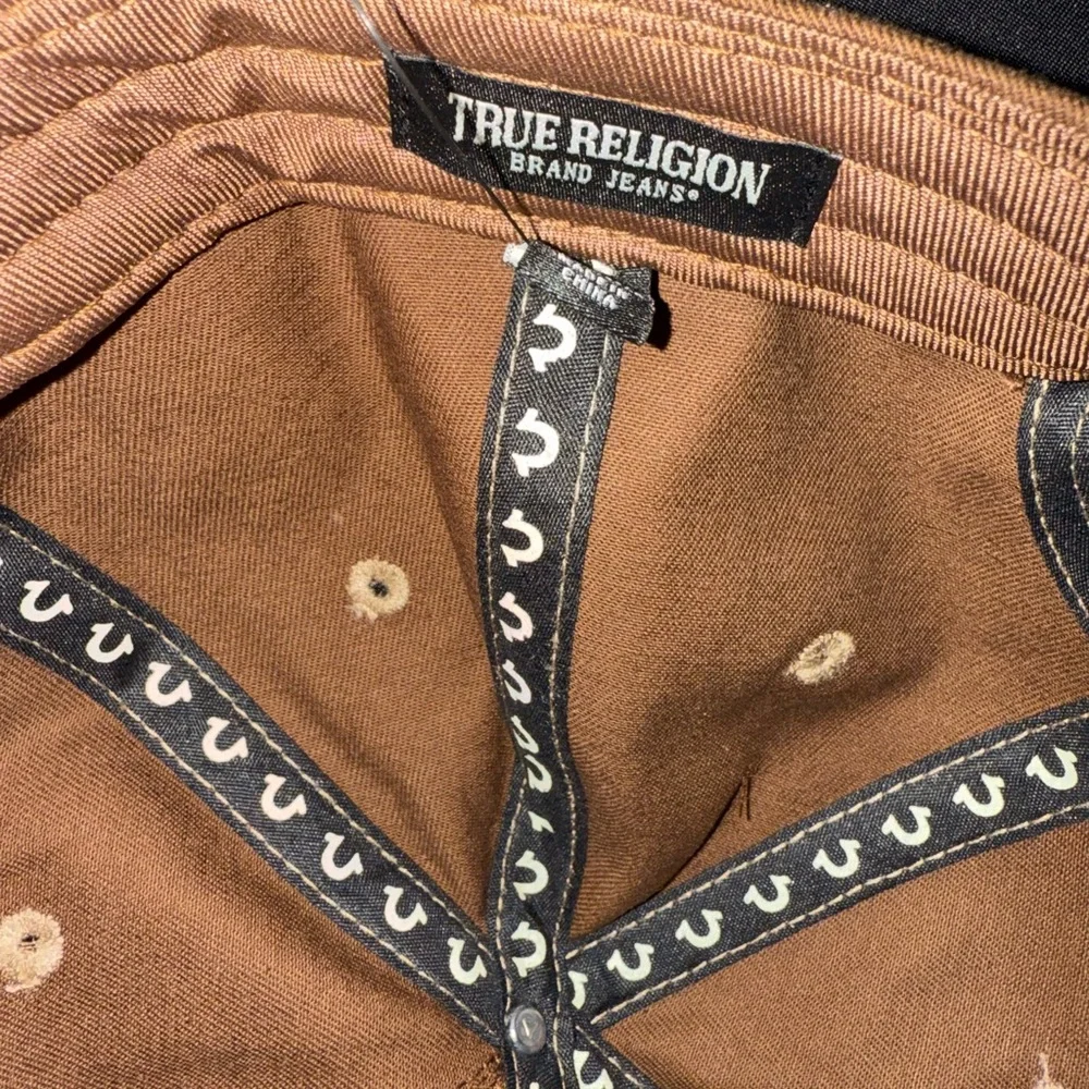 True Religion Brown Hat with White and Gold Embroidery